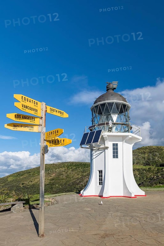 Lighthouse with signposts at Cape Reinga