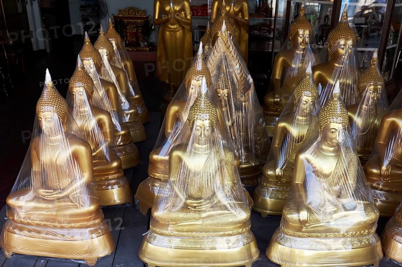 Buddha statues in foil