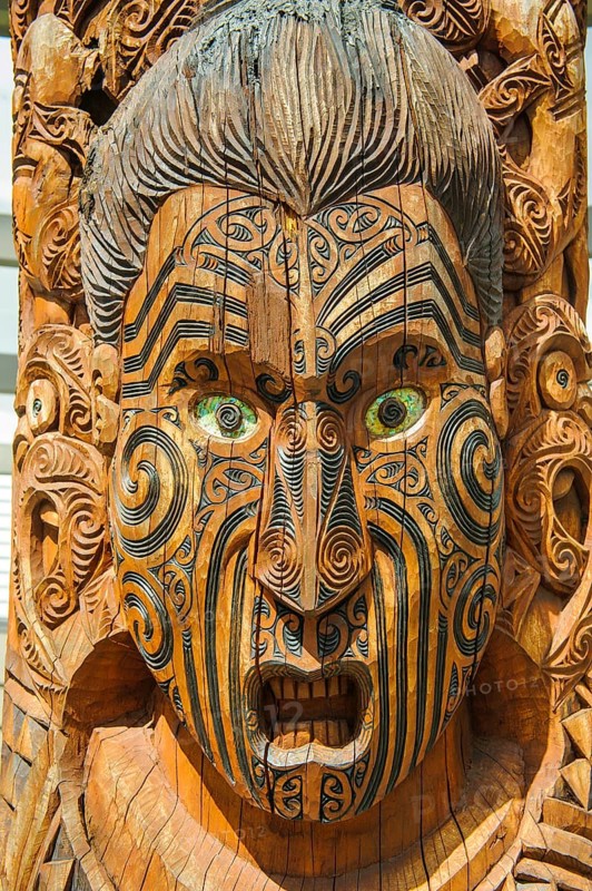 Traditional wood carved mask in the Te Puia Maori Cultural Center