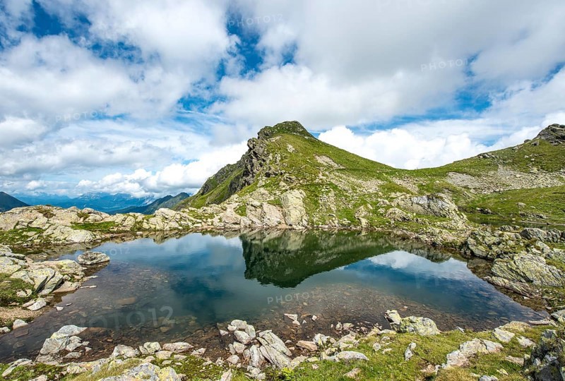 Landscape is reflected in a small lake