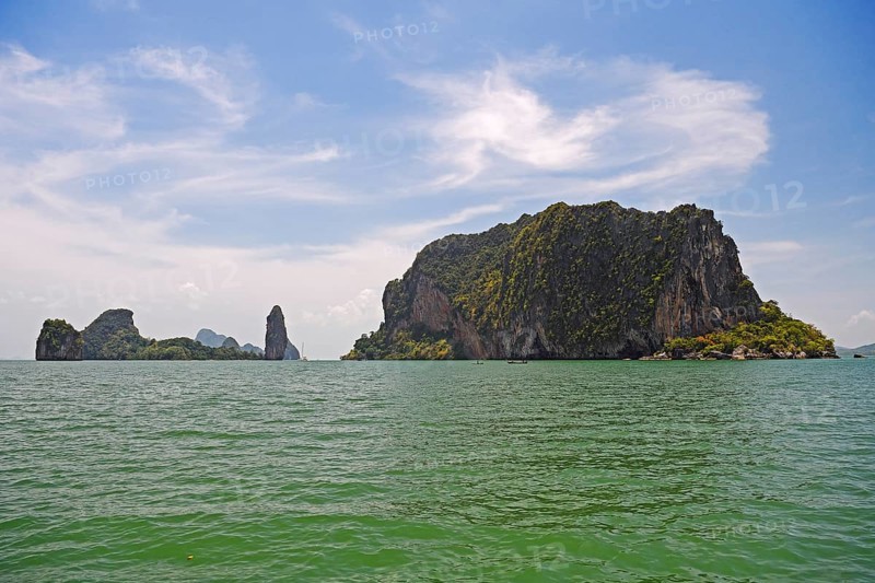Overgrown limestone rocks in Phang Nga Bay