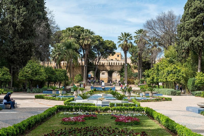 City park with fountain and flowers