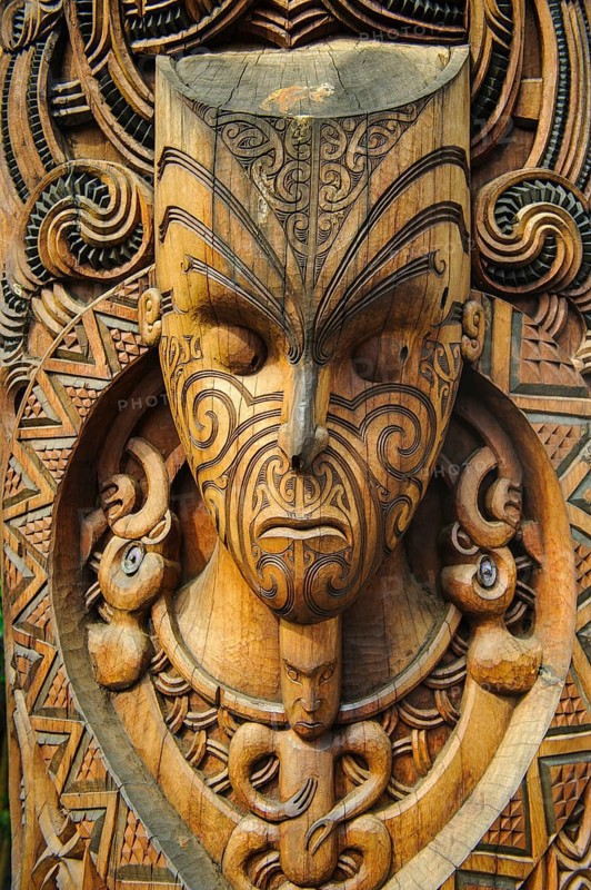 Traditional wood carved mask in the Te Puia Maori Cultural Center