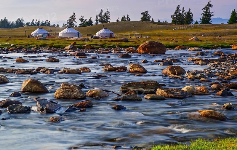 Nomads camp with yurts on the shore of Tuul river