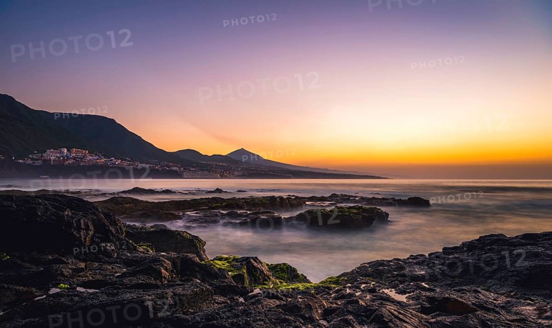 Rocky coast and sea at sunset