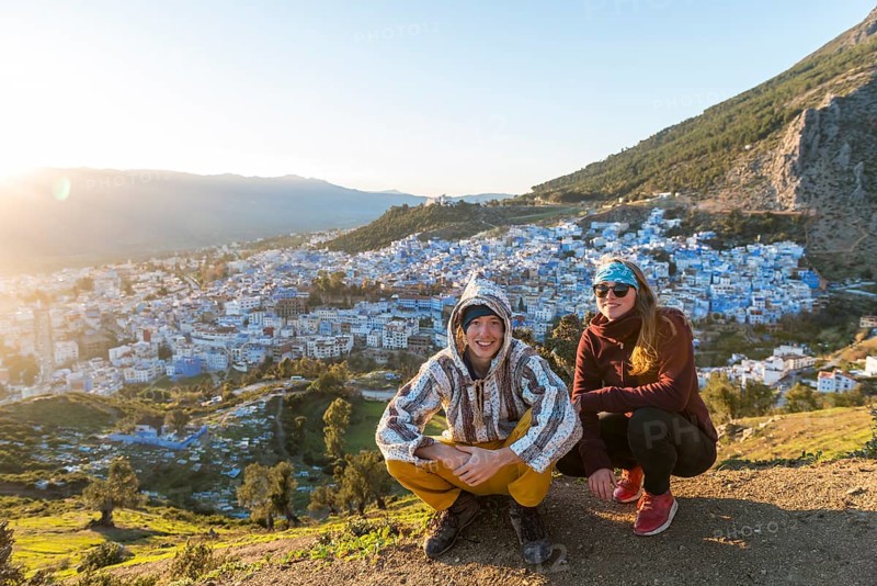 Young couple in Moroccan djellaba at lookout point