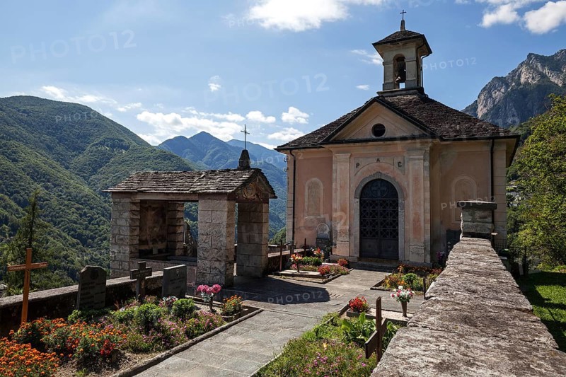 Cemetery with cemetery chapel in the mountain village Isorno