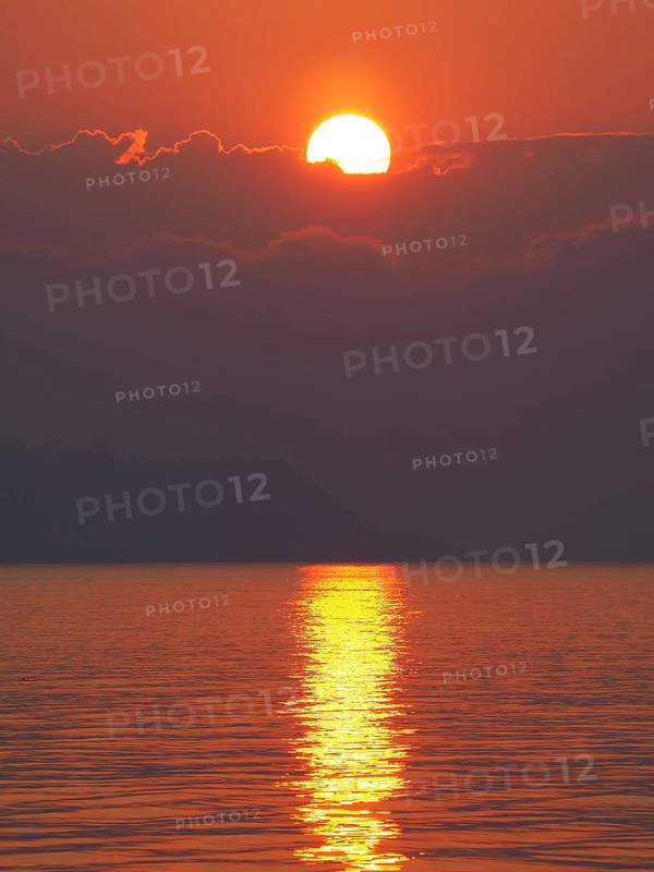 Sunrise over the sea in front of Ischia Ponte