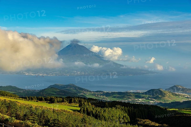 View of volcano Ponta do Pico with clouds