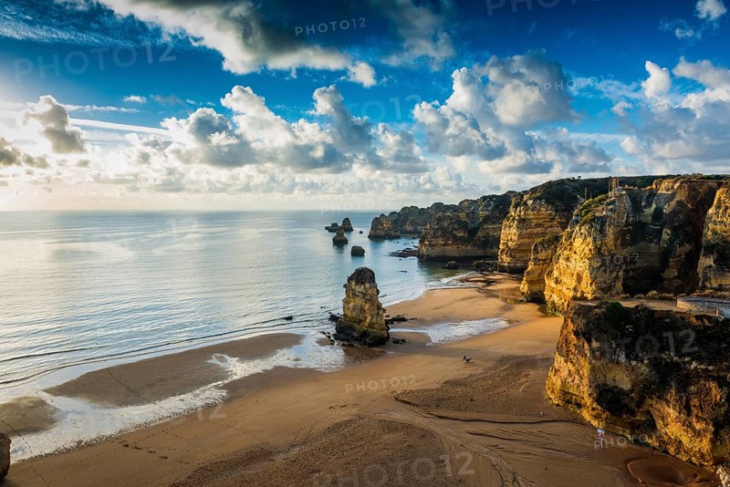 Coloured cliffs and sunrise at the beach