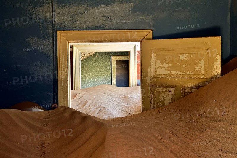 Desert sand in the ruined building of the former diamond city