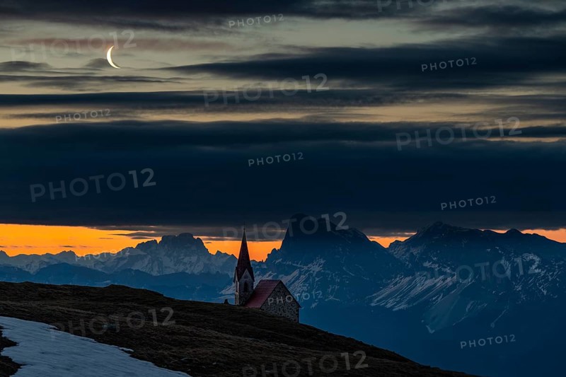 Latzfonser Kreuz Chapel at the Blue Hour with Crescent and South Tyrolean mountains