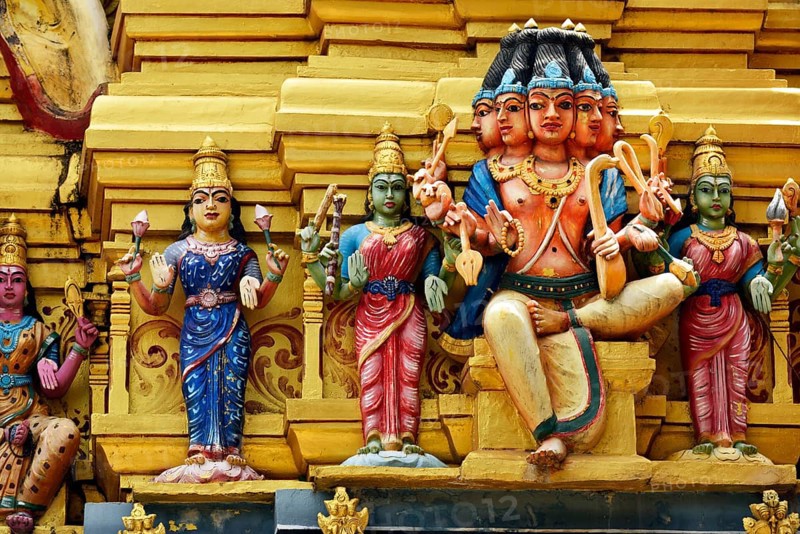 Colorful Hindu temple decorated with figures and gods