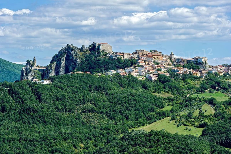 View of mountain village Bagnoli del Trigno with church Chiesa di San Silvestro and castle ruin Chiesa di San Silvestro