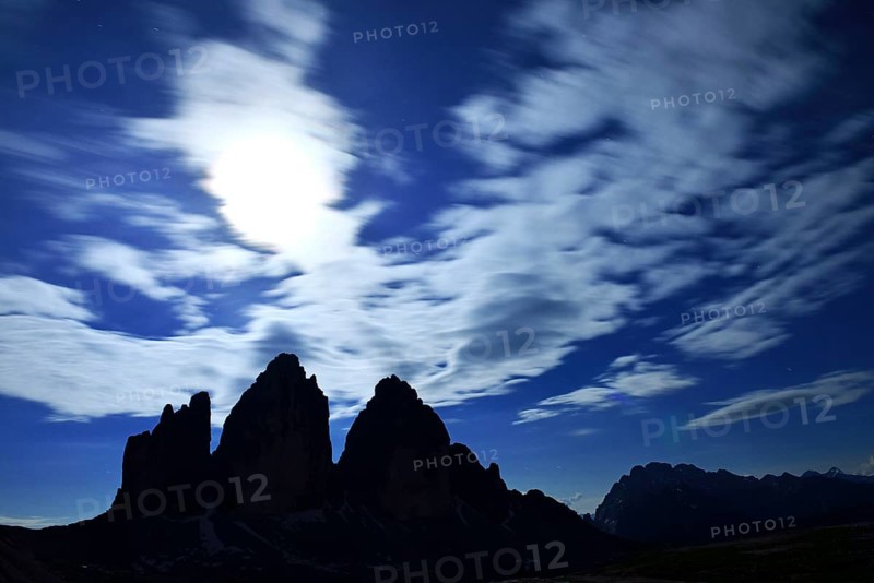 North walls of the Three Peaks of Lavaredo at full moon night