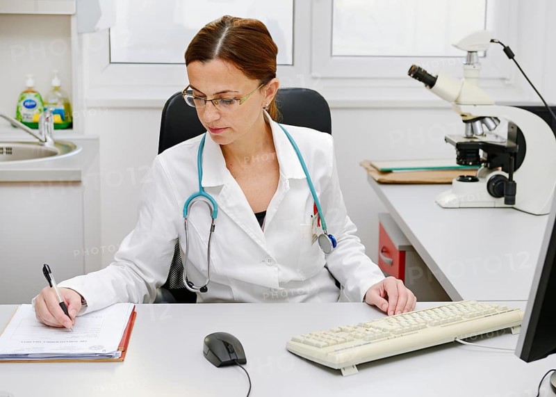 Doctor working at her desk