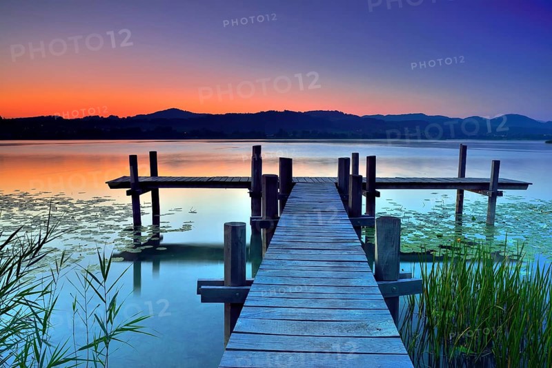 Wooden pier during dawn at Pfaffikersee
