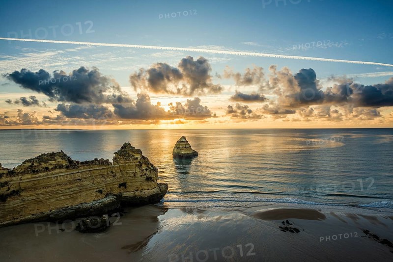 Coloured cliffs and sunrise at the beach