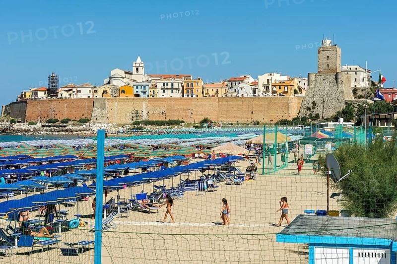 View over the beach to the Old Town with Cattedrale San Basso and Castello Svevo