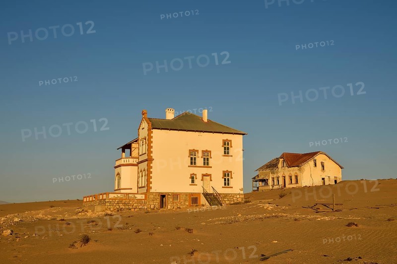Decaying houses of the accountant and mine manager of the former diamond town Kolmanskop