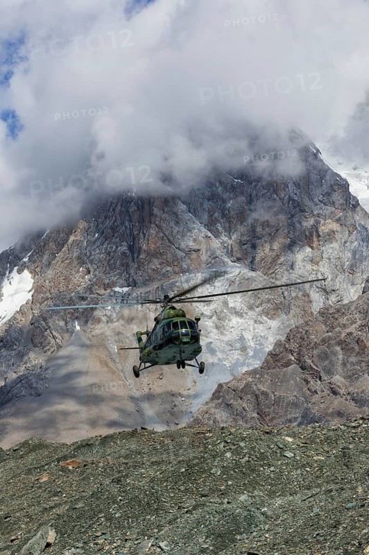 Helicopter landing at the Khan Tengri Base Camp