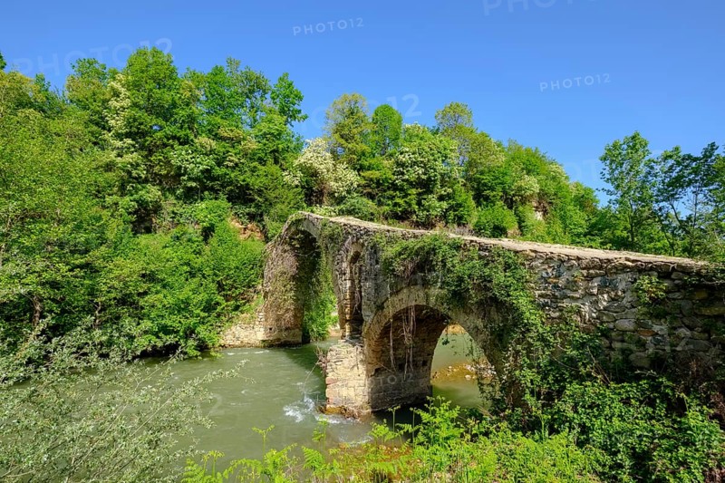 Old Ottoman stone arch bridge Ura e Golikut over river Shkumbin