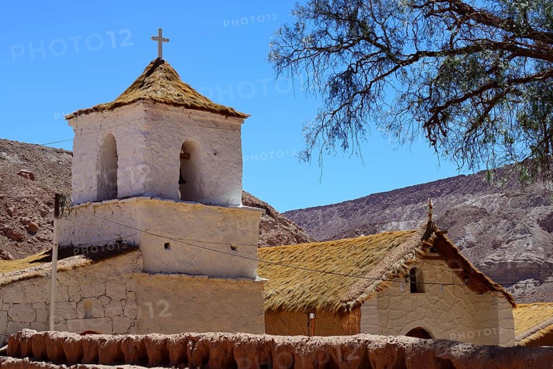 Church in the Adobese style with thatched roof