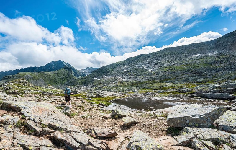 Hiker at a small lake