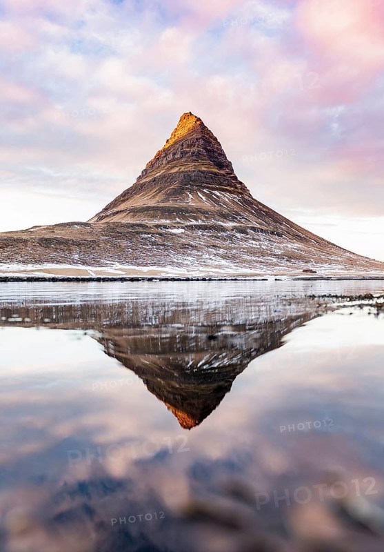 Mount Kirkjufell reflected in the water