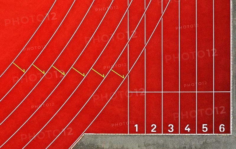 Start area for sprinters on a tartan track in an athletics stadium