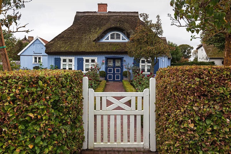 Typical blue thatched-roof house