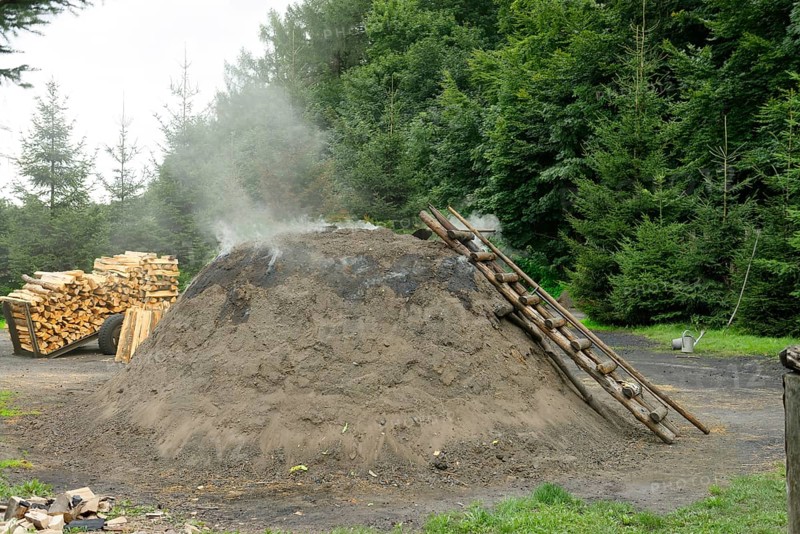 Burning charcoal kiln
