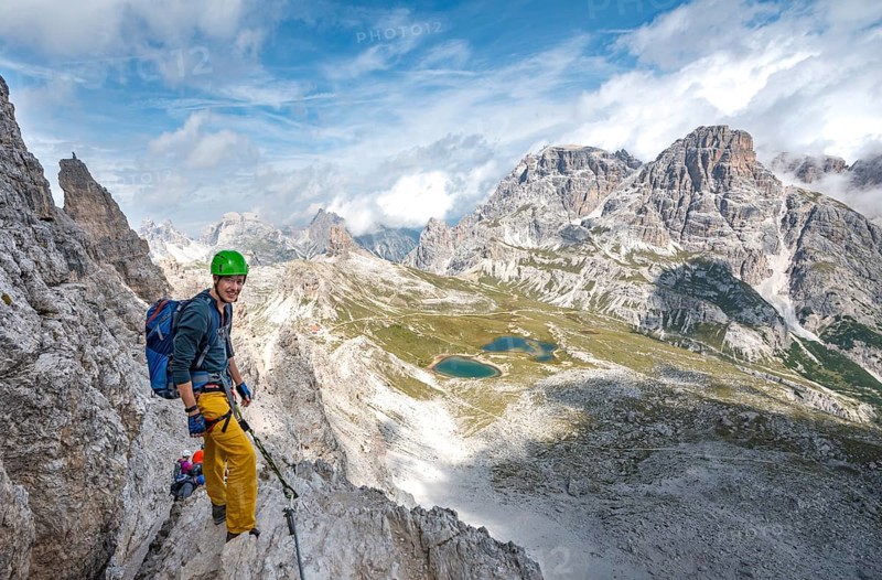 Hiker on the via ferrata to the Paternkofel