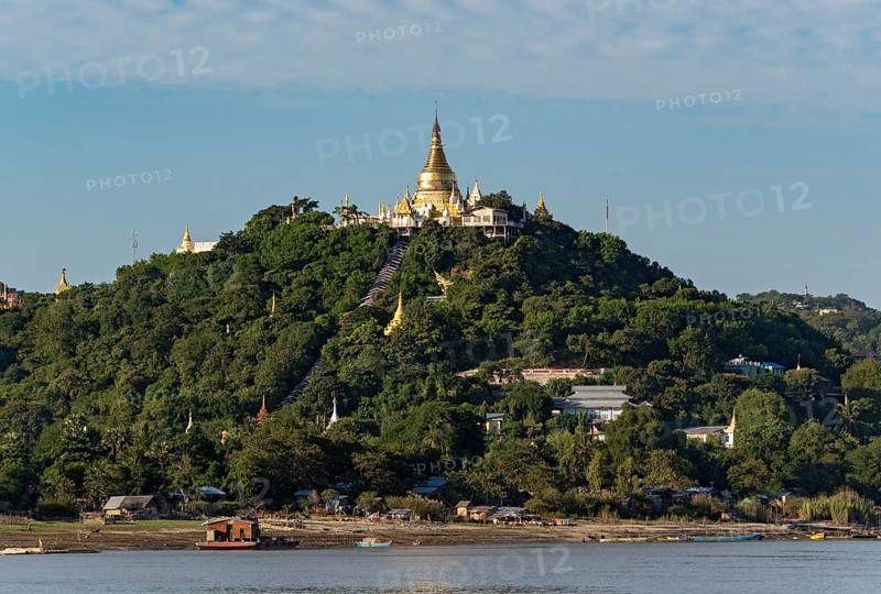 Gilded pagoda on Sagaing hill at Irrawaddy River