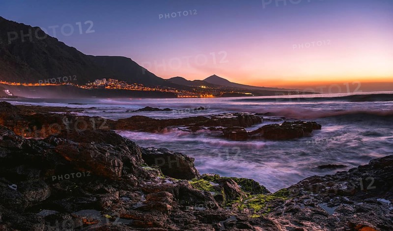 Rocky coast and sea at sunset