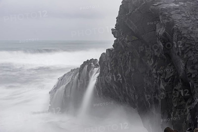 Cliffs of Dyrholey at Storm