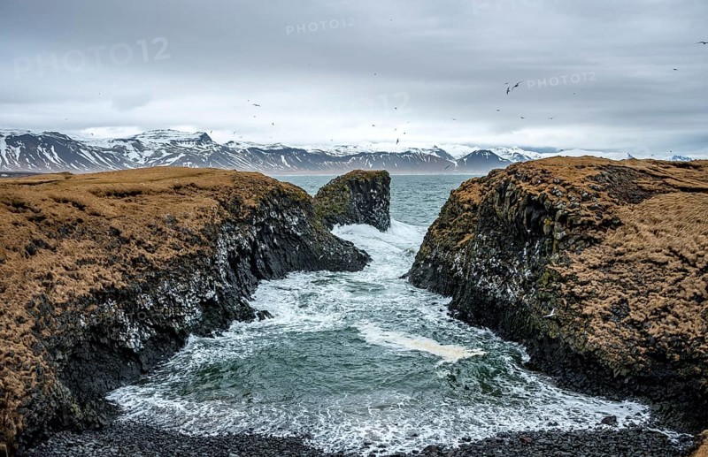 Heavy sea at the coast in a small bay