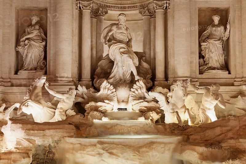 Sea god Oceanus with statues of abundance and healing power