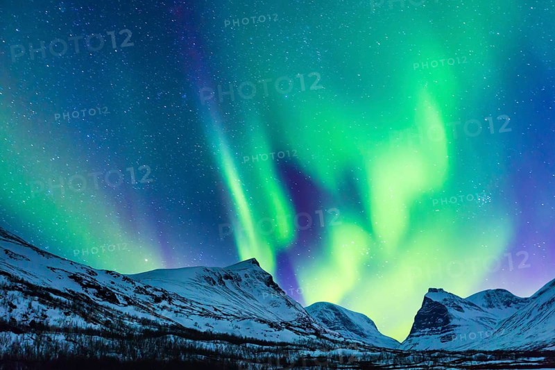 Northern Lights (Aurora borealis) over mountains