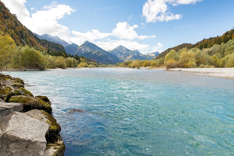 The river Lech with autumnal forest near the Ziegelwiesen