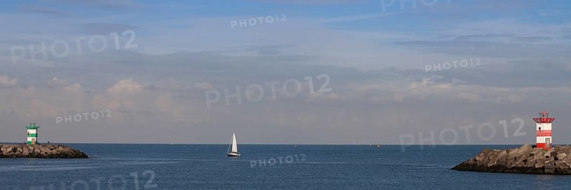 Small lighthouses at harbor entrance