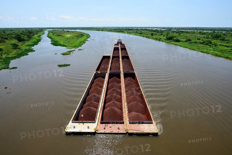 Pusher with iron ore cargo