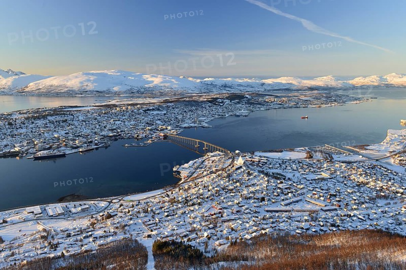 Snowy town with bridge