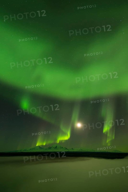 Aurora over the Copper River and the distant peaks of Wrangell Mountains