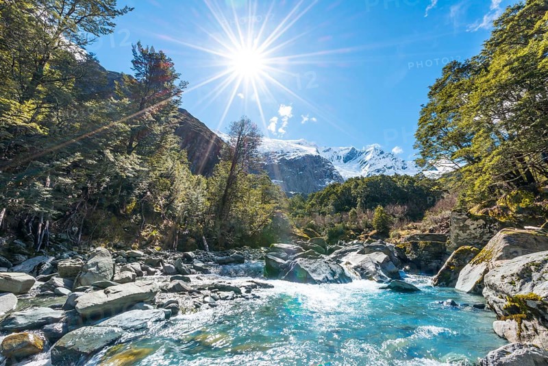 Glacial river flowing through mountains