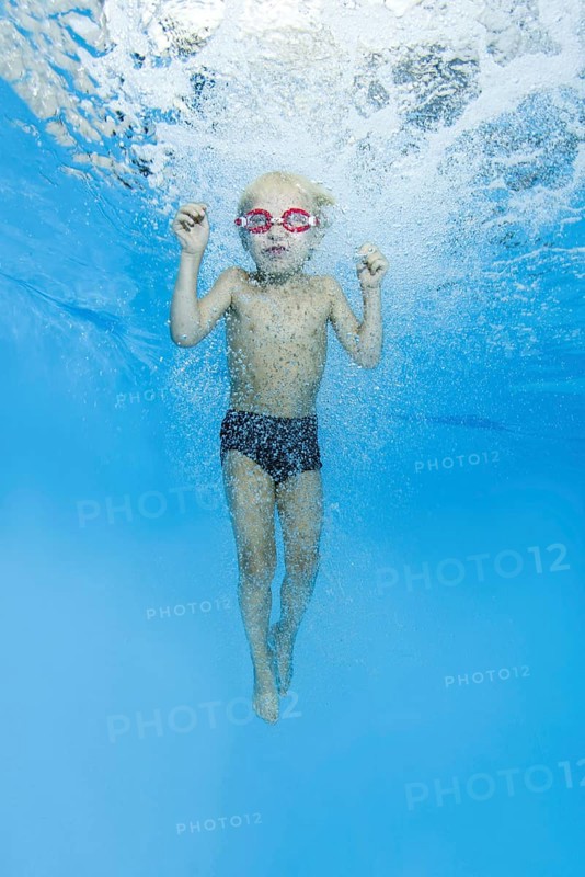 Little boy with swimming goggles