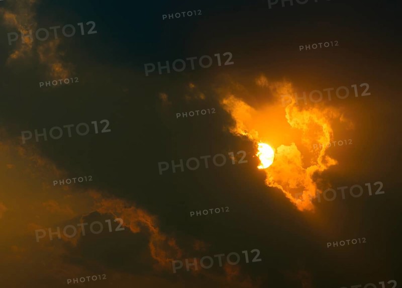 Sunset behind dark clouds