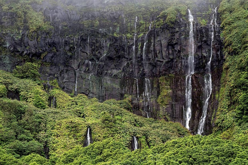 Waterfalls over lava rocks