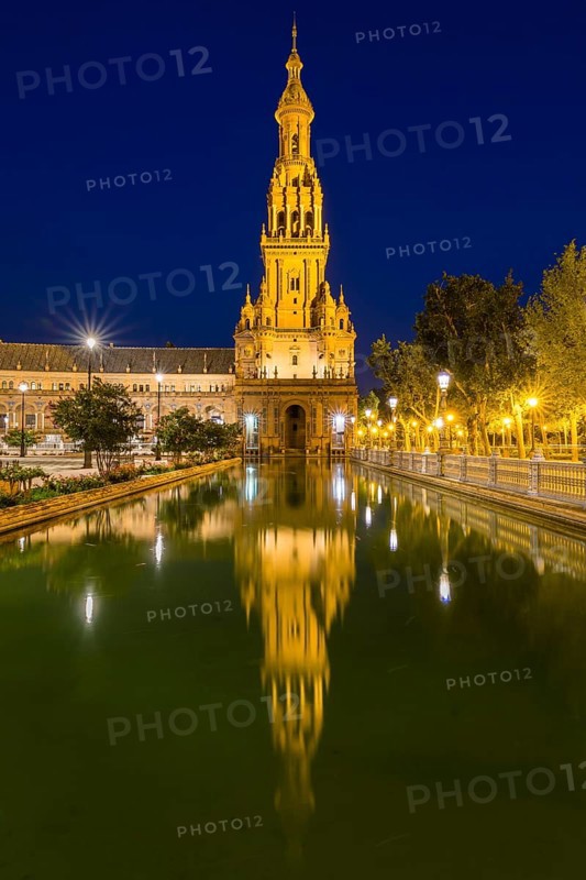 Tower reflected in water basin