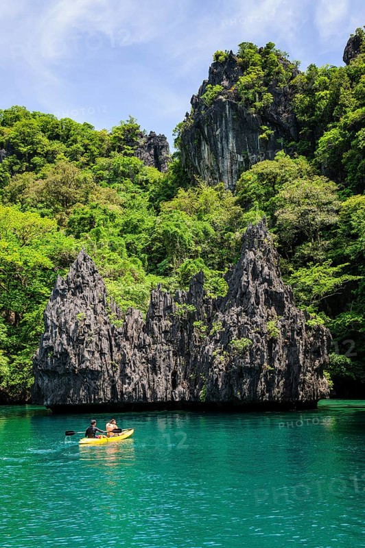 Kayaking in the crystal clear water in the Bacuit archipelago